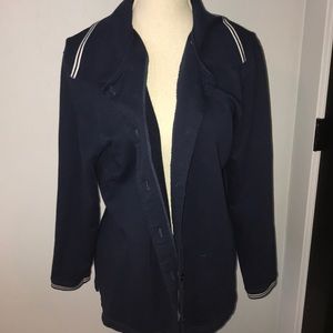 dark blue cardigan with white stripes on collar